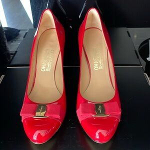 Salvatore Ferragamo red patent leather pumps
